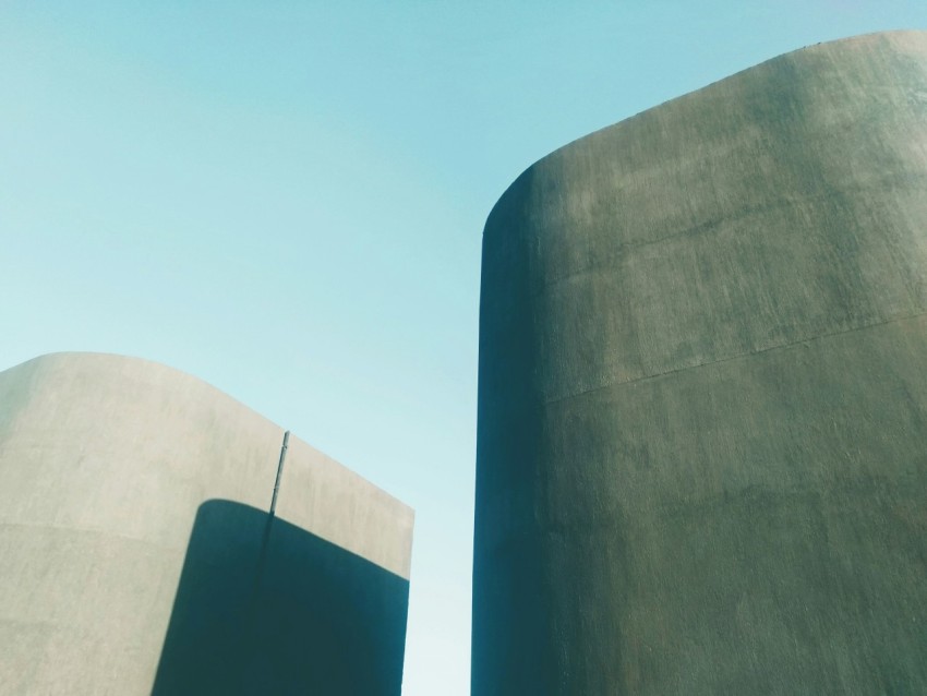 a couple of cement structures sitting next to each other