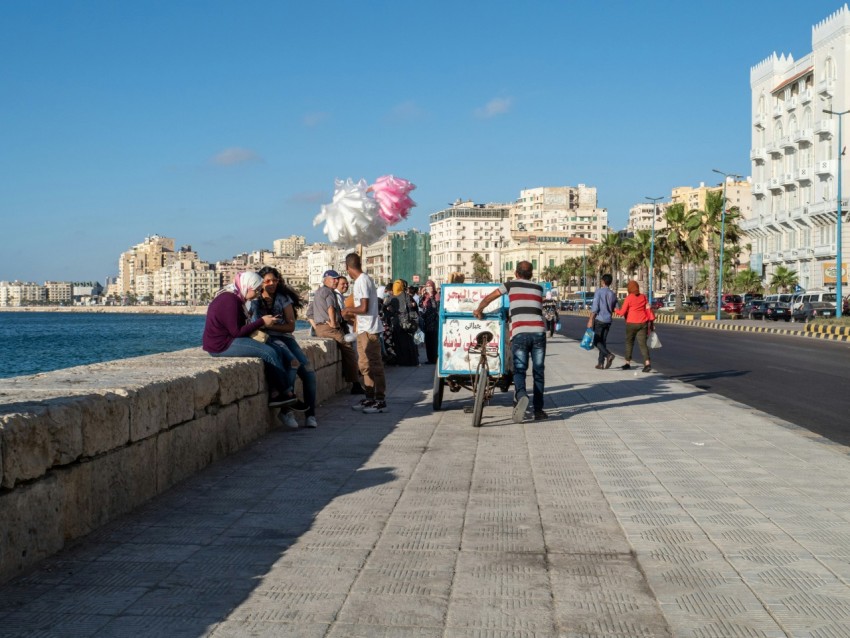 people walking on sidewalk during daytime pa46SmFg2