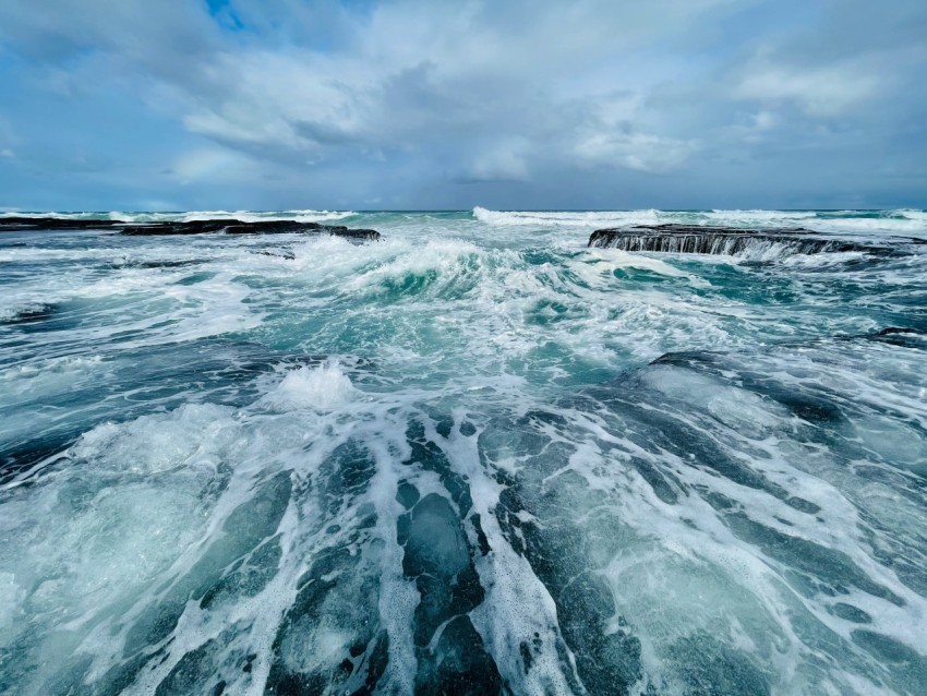 a body of water with waves