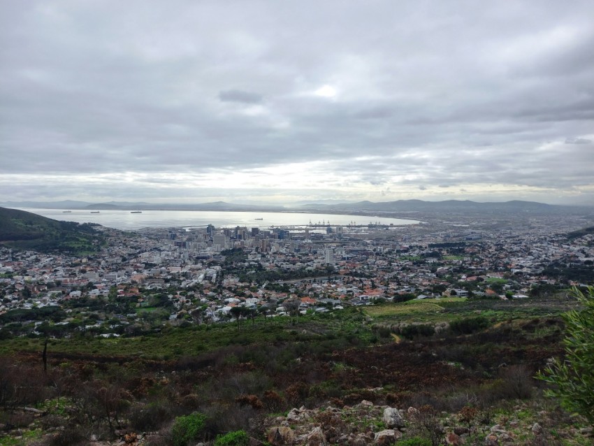 a view of a city from a hill