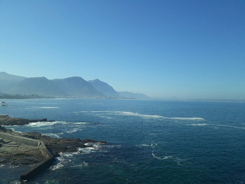 blue sea under blue sky during daytime