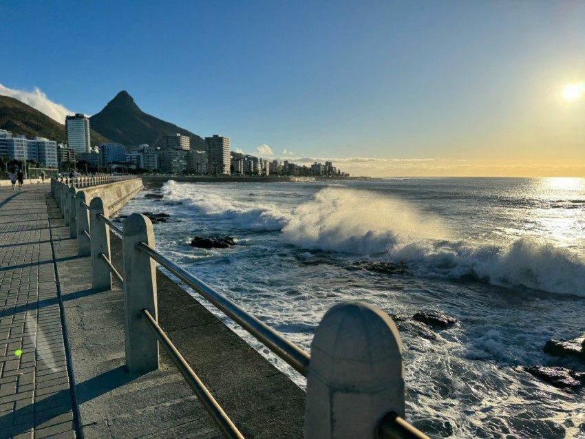 a view of the ocean with waves crashing on the shore