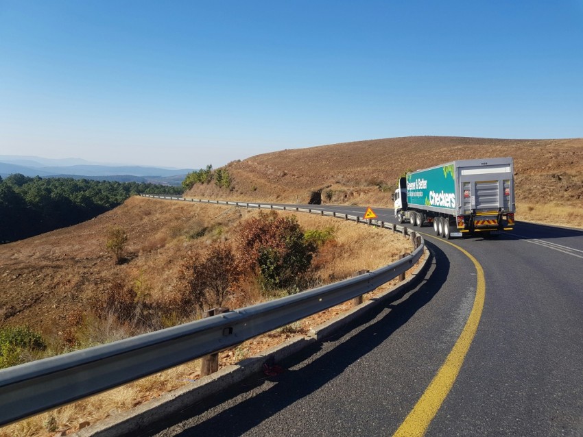 white and blue truck on road during daytime h