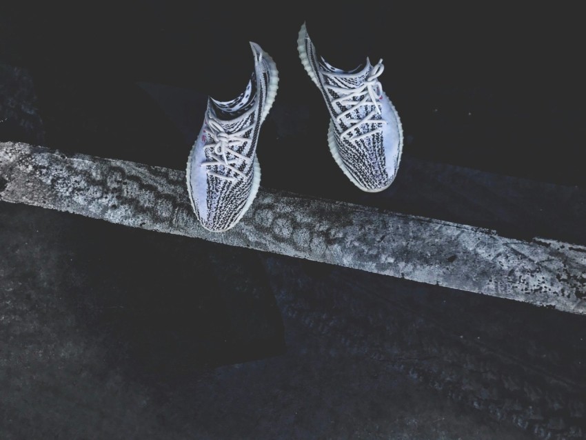 pair of gray and black adidas yeezy boost 350s gVgu