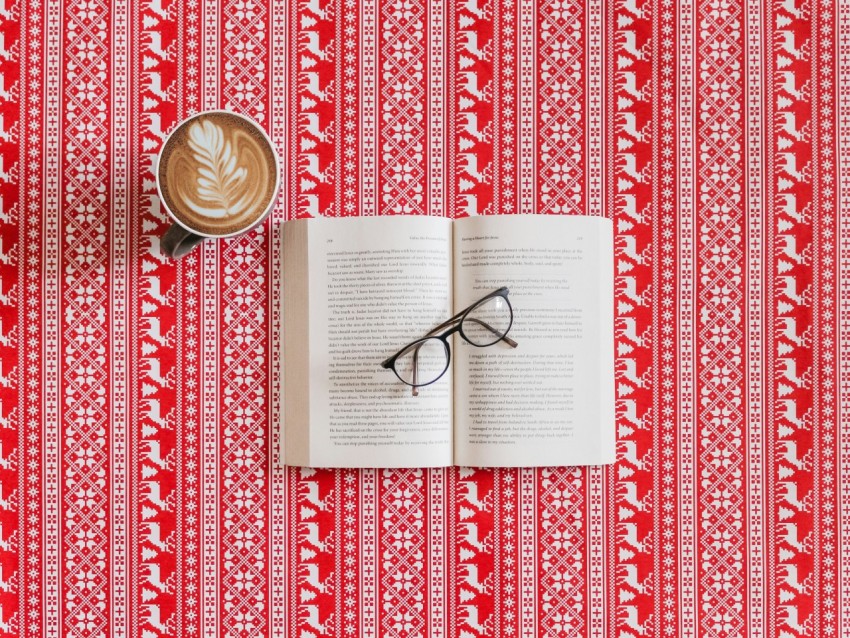 black frame eyeglasses on top of the book Vf