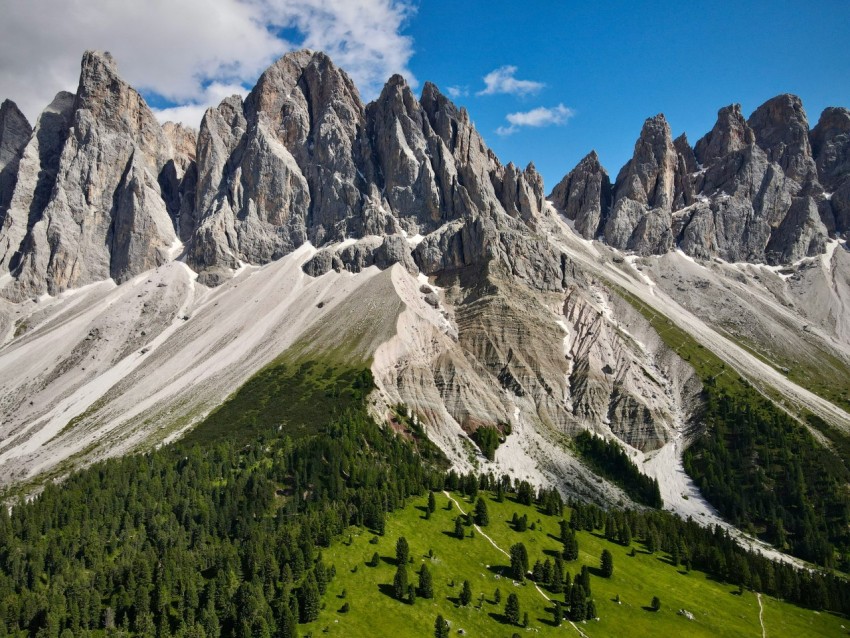 an aerial view of a mountain range in the mountains 4zyCqiB