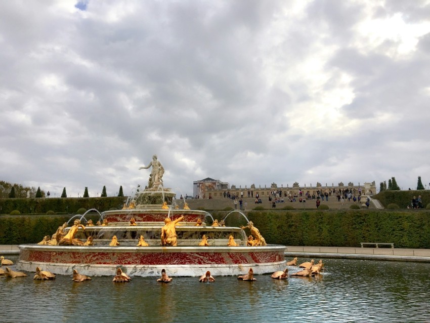 a large fountain with a statue on top of it