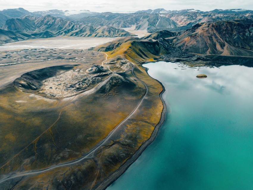 a large body of water surrounded by mountains