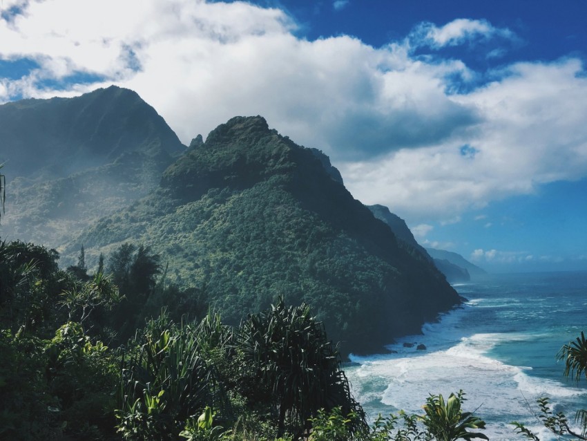 landscape photography of mountain near sea lww