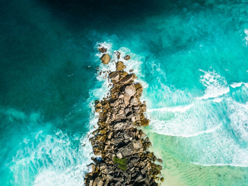 aerial view of rocks near coastline