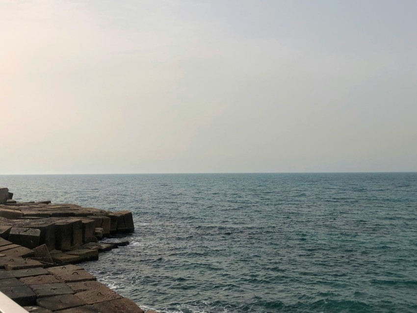 a view of a body of water from a pier