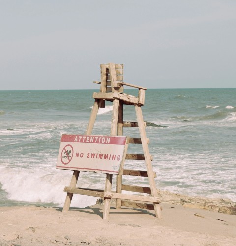 a wooden structure on a beach