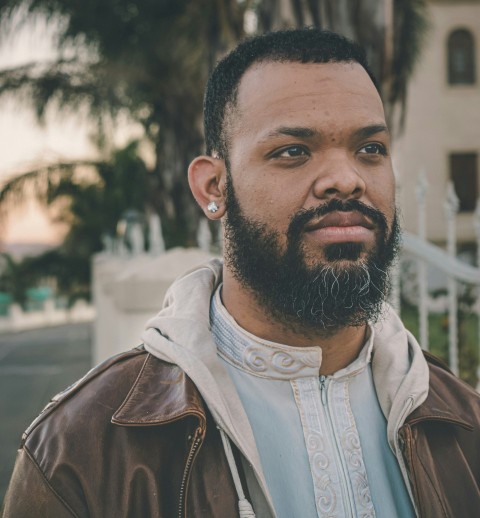 a close up of a person wearing a jacket