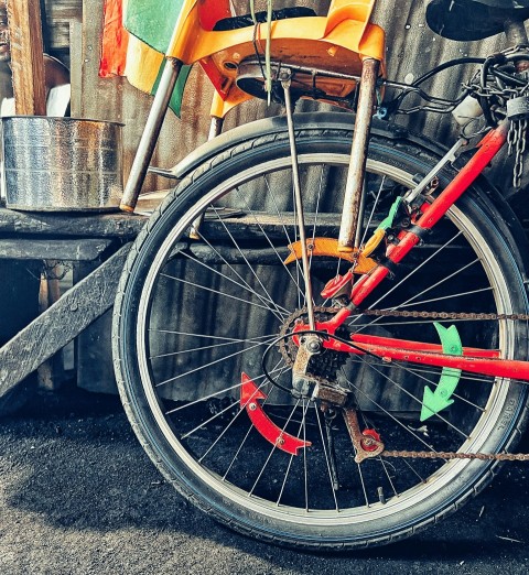 a bicycle with a red frame