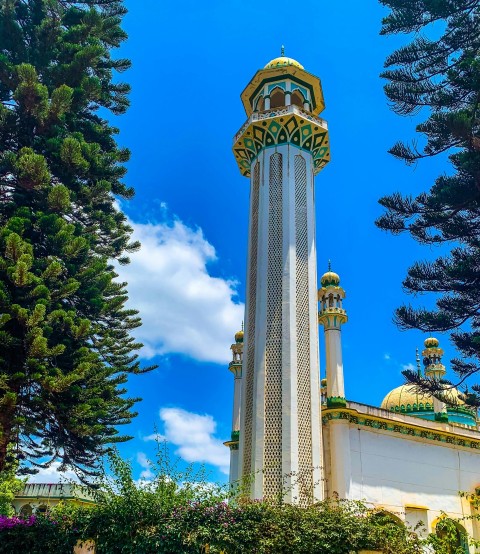 a tall tower with a clock on top of it