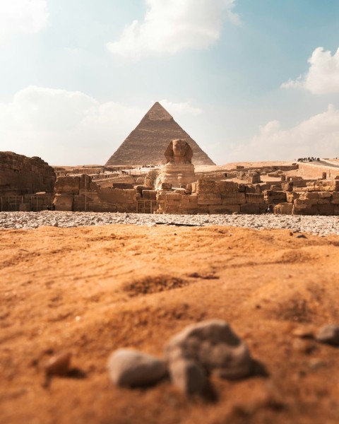 a group of pyramids in a desert