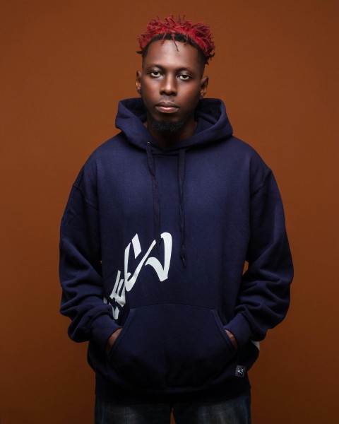 a man with a red bandana on his head