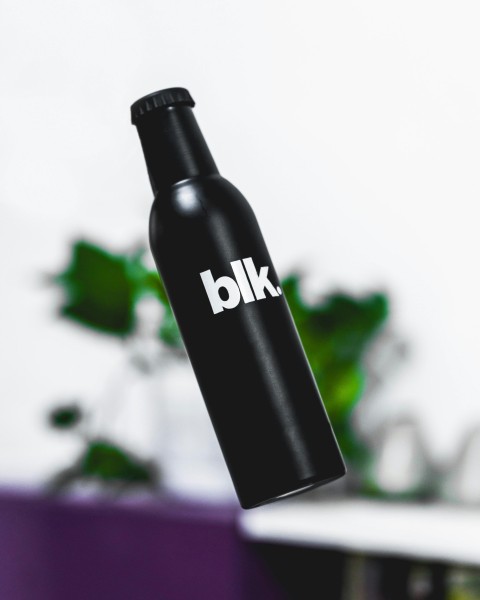 black and white blk glass bottle