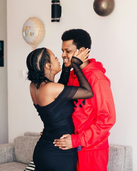 a man and a woman standing next to each other