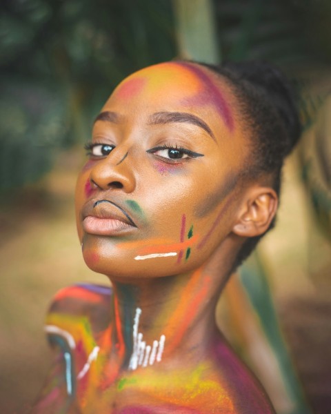 a woman with a painted face and chest