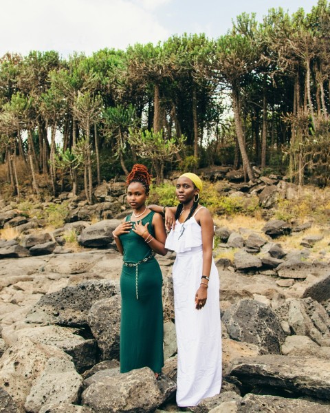 a couple of women standing next to each other