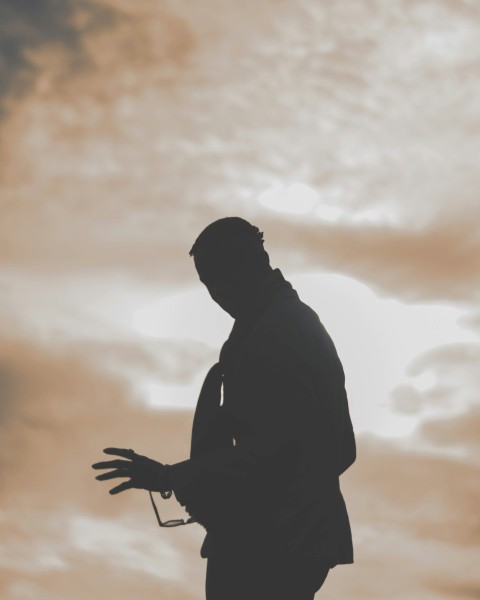 a person standing in the sand