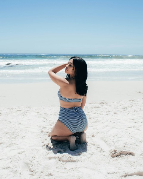 woman in blue and white striped bikini on beach during daytime bhnwJ5Rkm