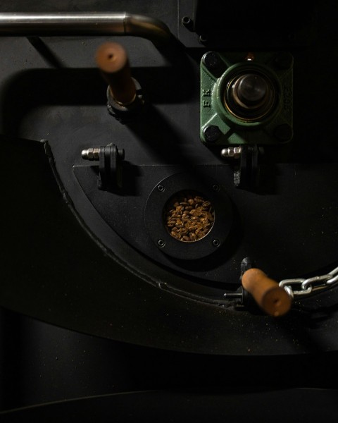 a close up of a car steering wheel and a small camera