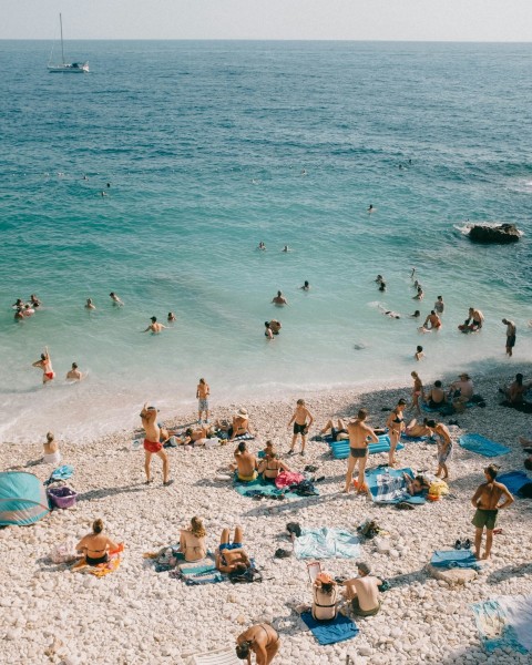 a group of people at a beach