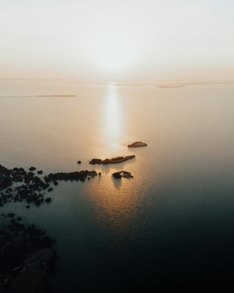 a large body of water surrounded by land