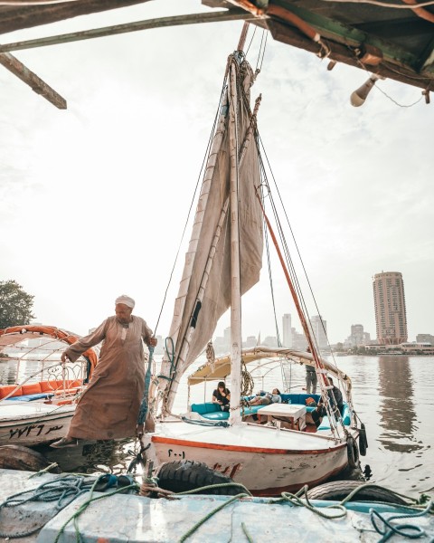 man standing near sailing boat Nr