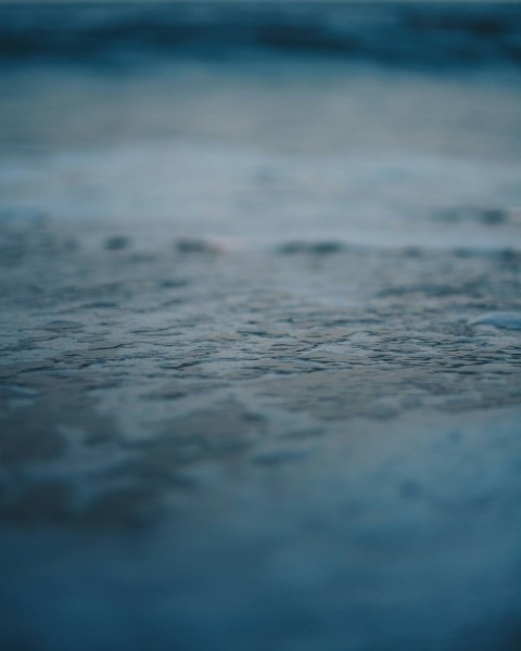 water droplets on gray concrete floor SEi