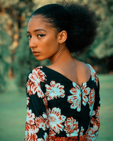 woman in black red and white floral long sleeved shirt