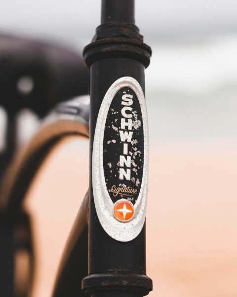 a close up of a bike with a sticker on it