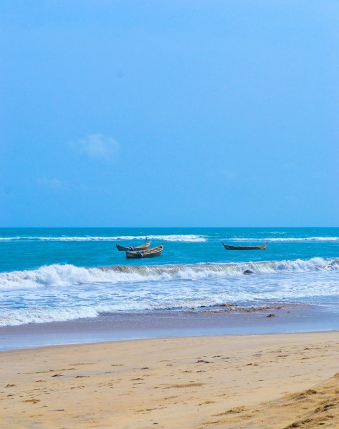 a couple of boats that are sitting in the water