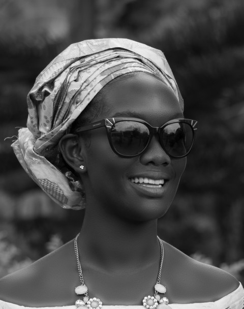 grayscale photo of woman wearing sunglasses and hijab