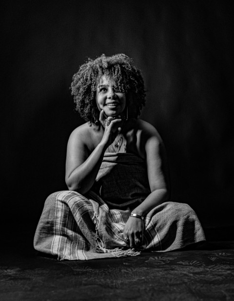 a woman sitting on the floor