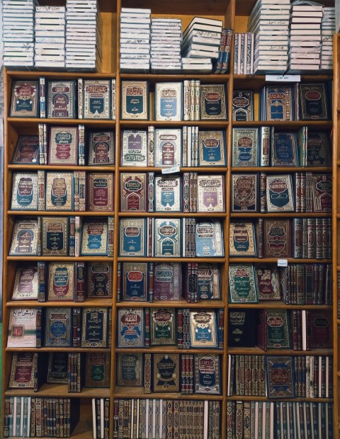 a book shelf filled with lots of books