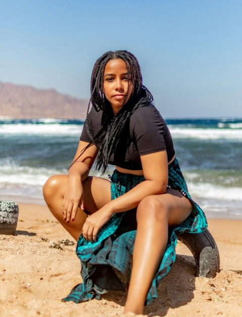 a person sitting on a beach