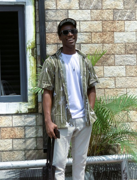 a man wearing sunglasses and a hat