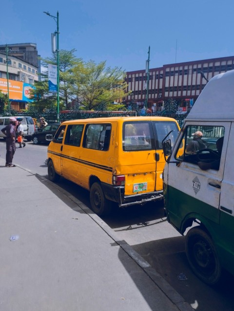 a yellow van on the street