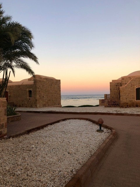 brick buildings facing ocean