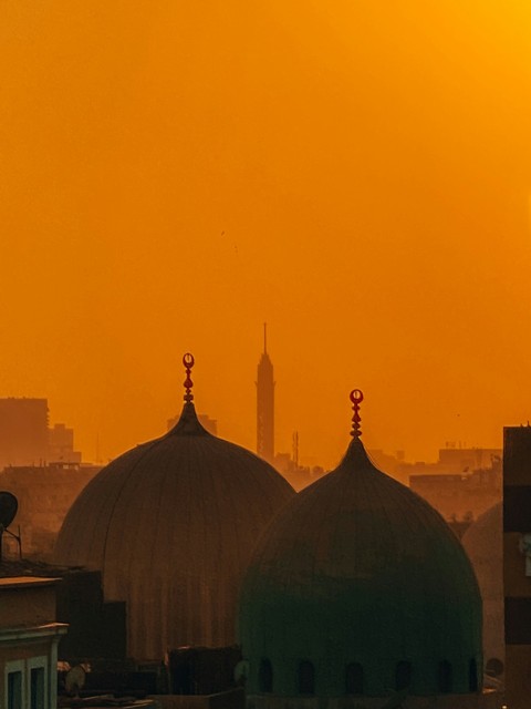 a view of a city from a rooftop of a building