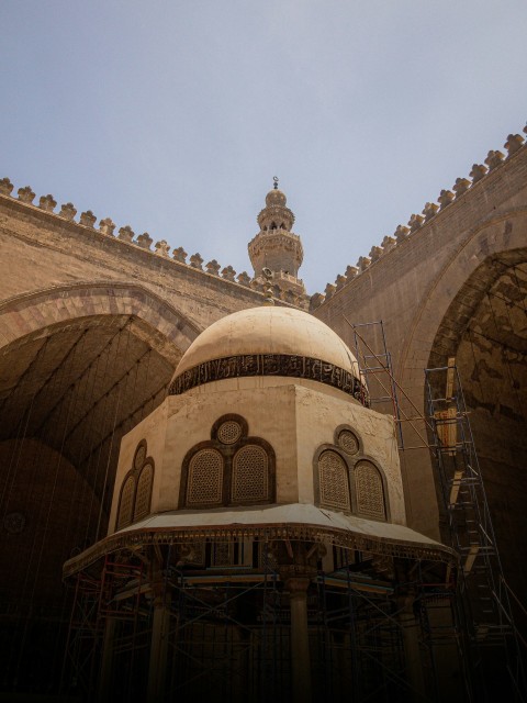 a building with a dome and scaffolding around it