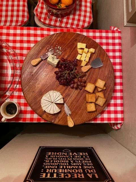 brown wooden round plate with sliced bread