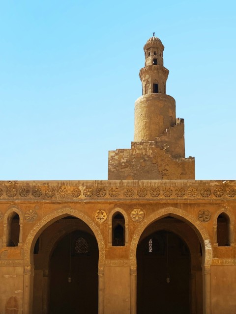 a tall tower with a clock on top of it