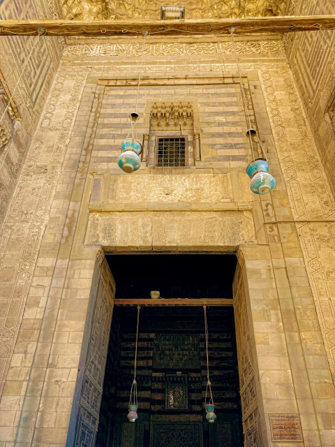 a tall building with a clock on the side of it