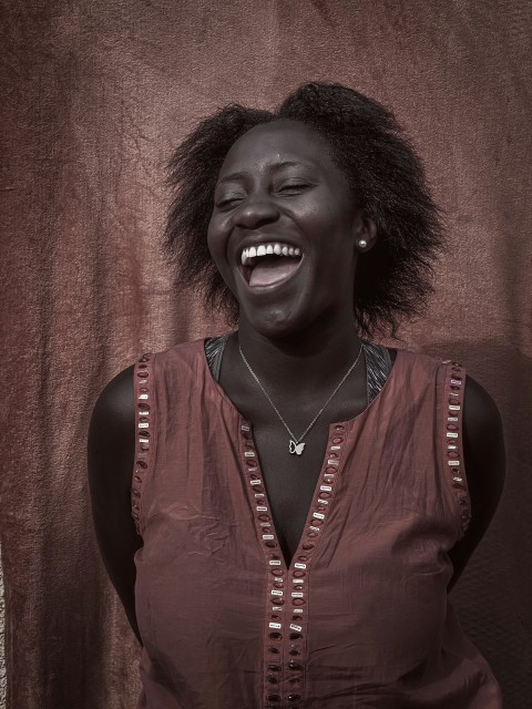 a woman with a smile on her face