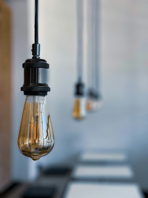 a group of light bulbs hanging from a ceiling