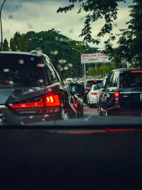 a bunch of cars that are sitting in the street